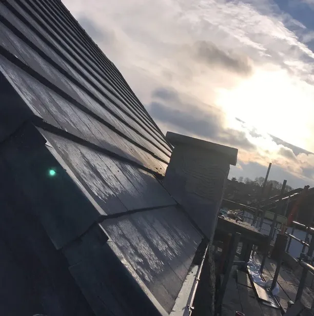Chimney on grey roof