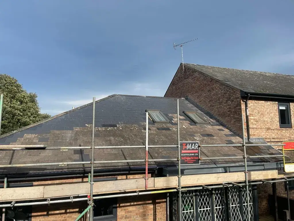 the roof of a building with a sign on it